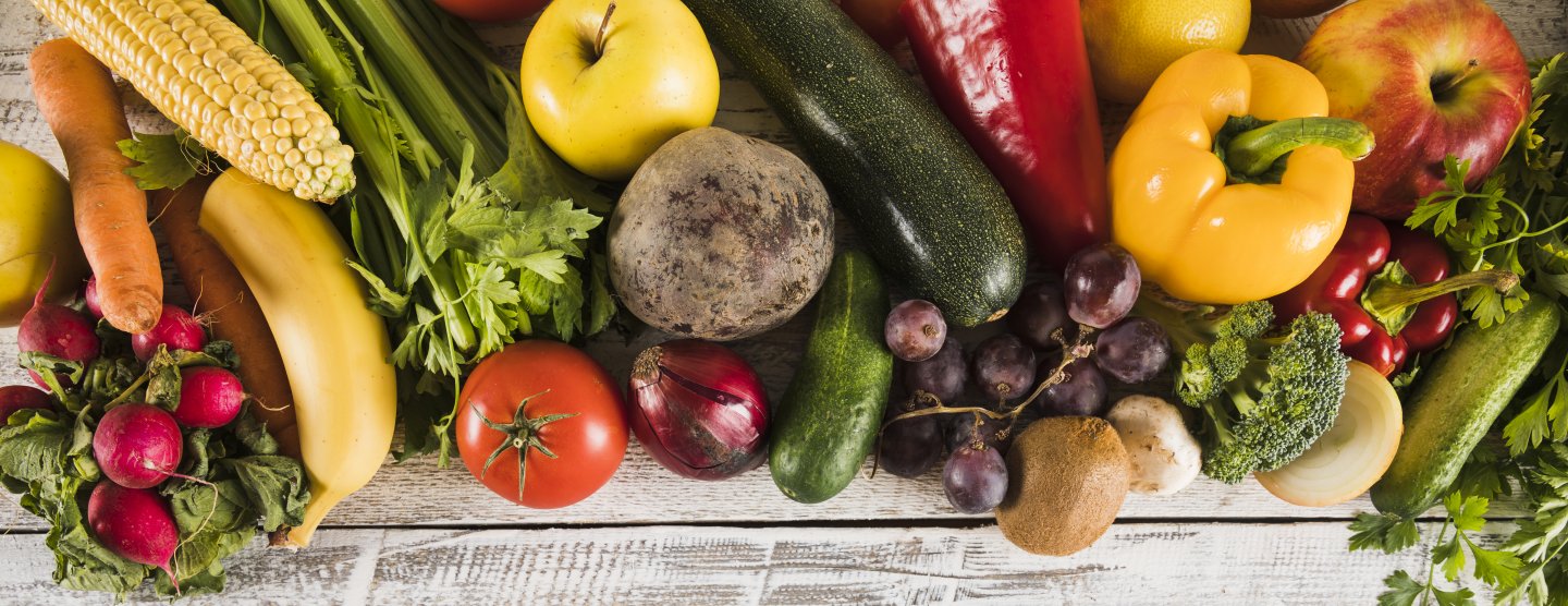 fruits and vegetables arranged on a table