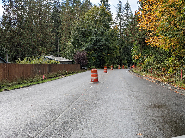 Work to install final top layer of pavement.