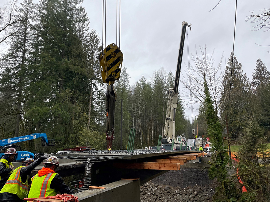  Feb. 7, 2023 – It takes multiple crewmembers on each side of the new span to perfectly align the new bridge girders.