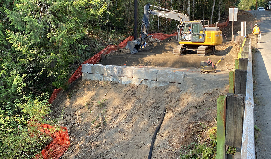 Oct. 10, 2022 – Concrete abutments are placed to provide support for the new temporary bridge.